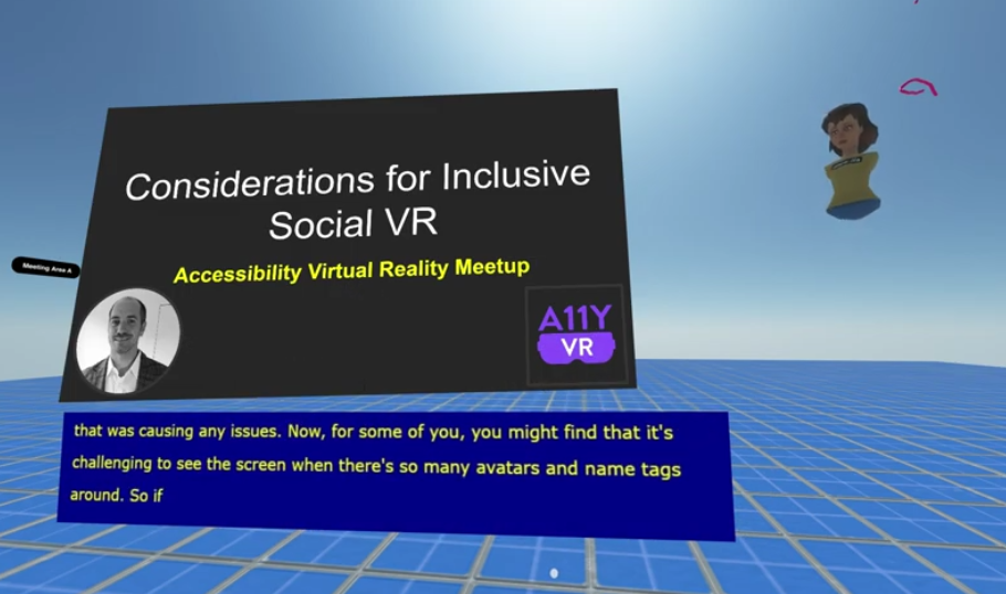 First A11yVR Meetup appears on a scene with gridlines with a large screen for the presentation and a box for the captions below the screen. Elgin-Skye's avatar floats to the right of the screen.