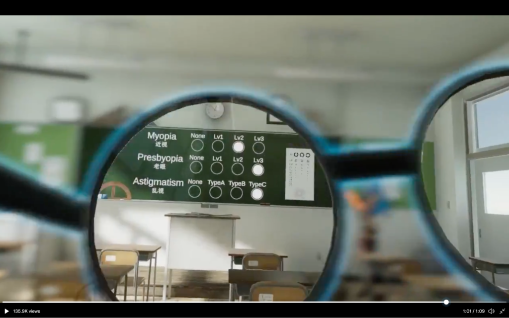 Screenshot looks through glasses showing the blackboard clearly while the area outside of the glasses appears blurry to demo Myopia