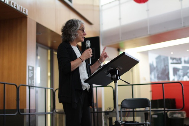 Lainey on stage speaking