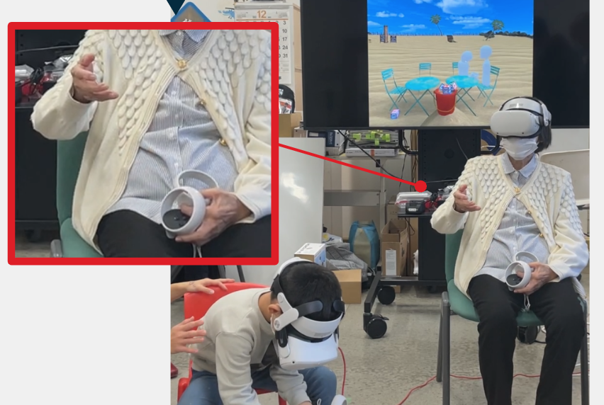 A senior holds both controllers in their left hand and tries to shake hands with their right hand.