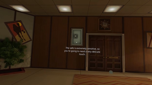 A scene from Esper 2 that shows a combination safe in a wall with captions appearing close to the safe. The caption says "The safe is extremely sensitive, so you're going to need a very delicate touch"